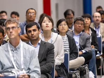 Photo of geophysicists attending a lecture and listening attentively.